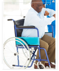 caregiver assisting senior man to stand